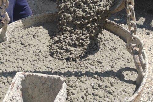 fresh concrete beeing poured