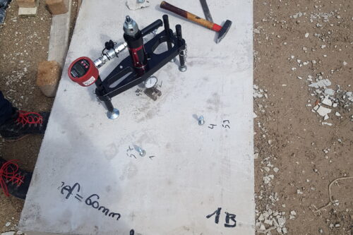 a concrete slab with testing equipment