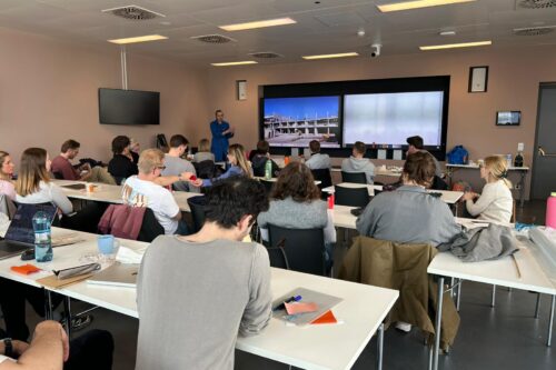 People listening to a presentation