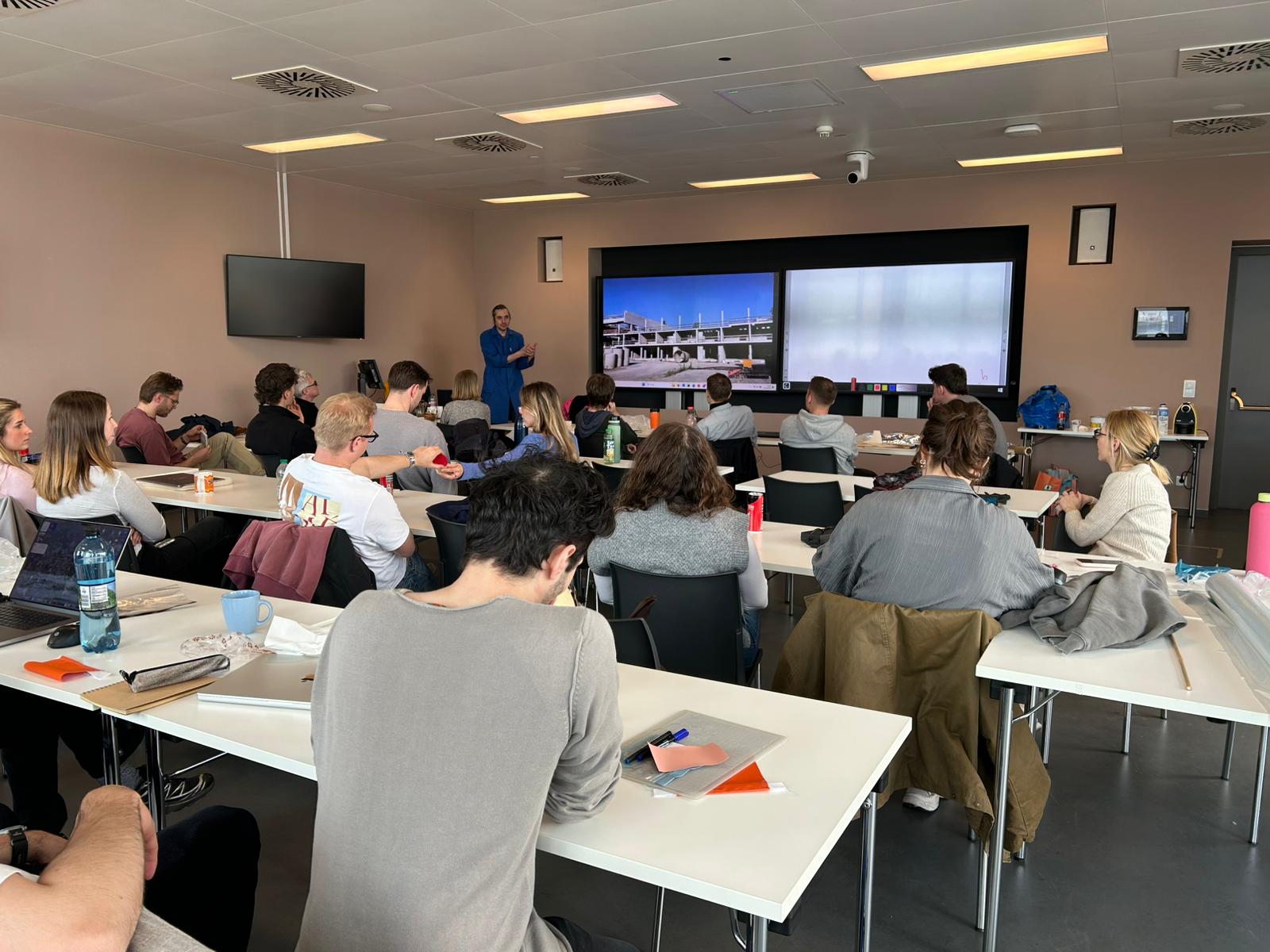 People listening to a presentation